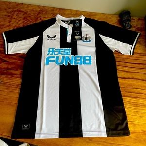 NWT Newcastle United 2021 home top. Straight from the Castore. Never worn.